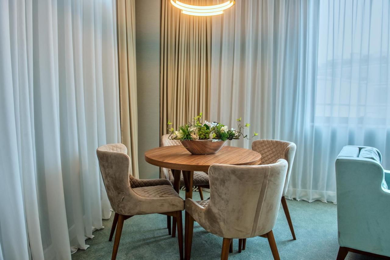 Hotel Pupin Novi Sad Luaran gambar A dining room in a hotel